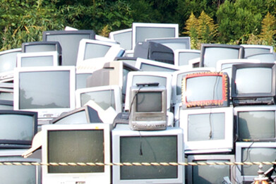 Mountain of old TVs