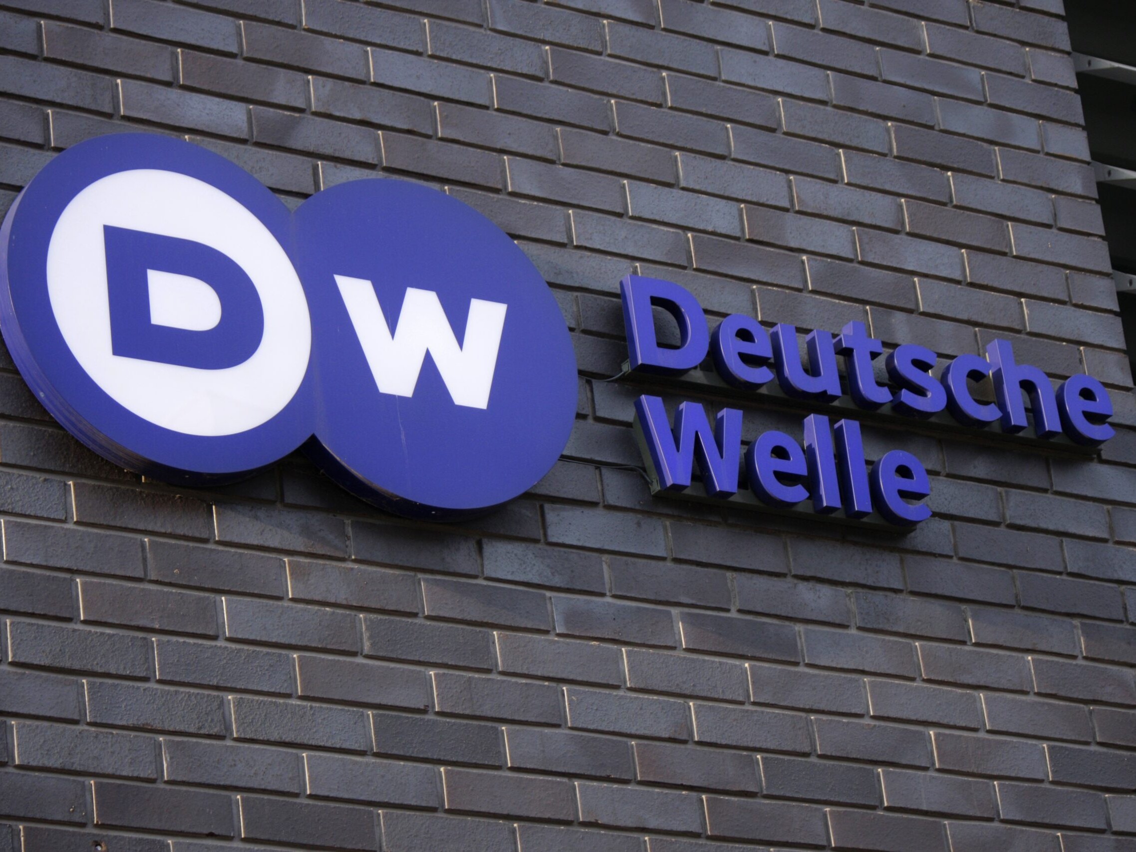 Sign of Deutsche Welle on a wall