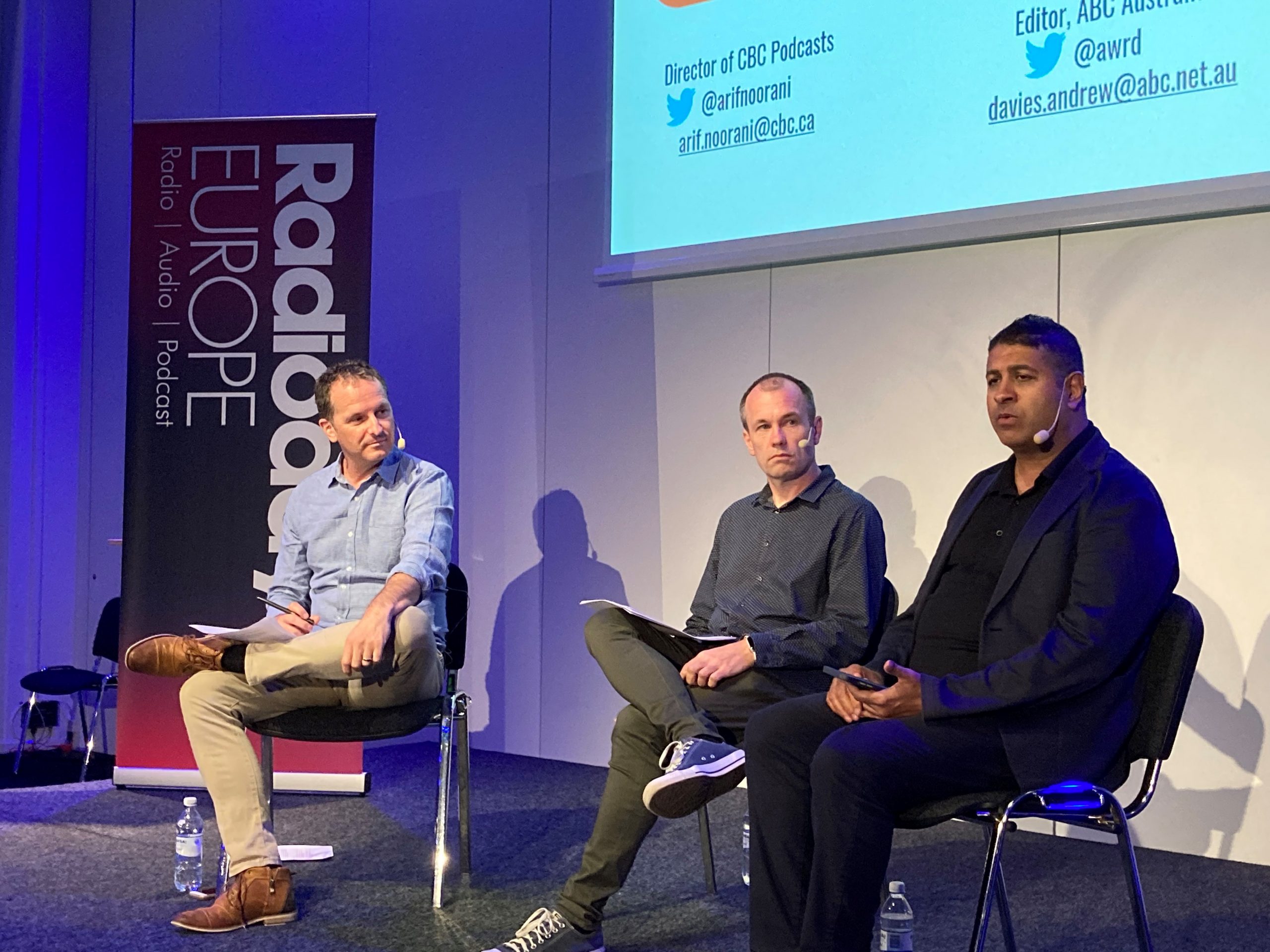 (From left to right) Tim Watkin, Andrew Davies, and Arif Noorani speaking at Radiodays Europe in May 2022.
