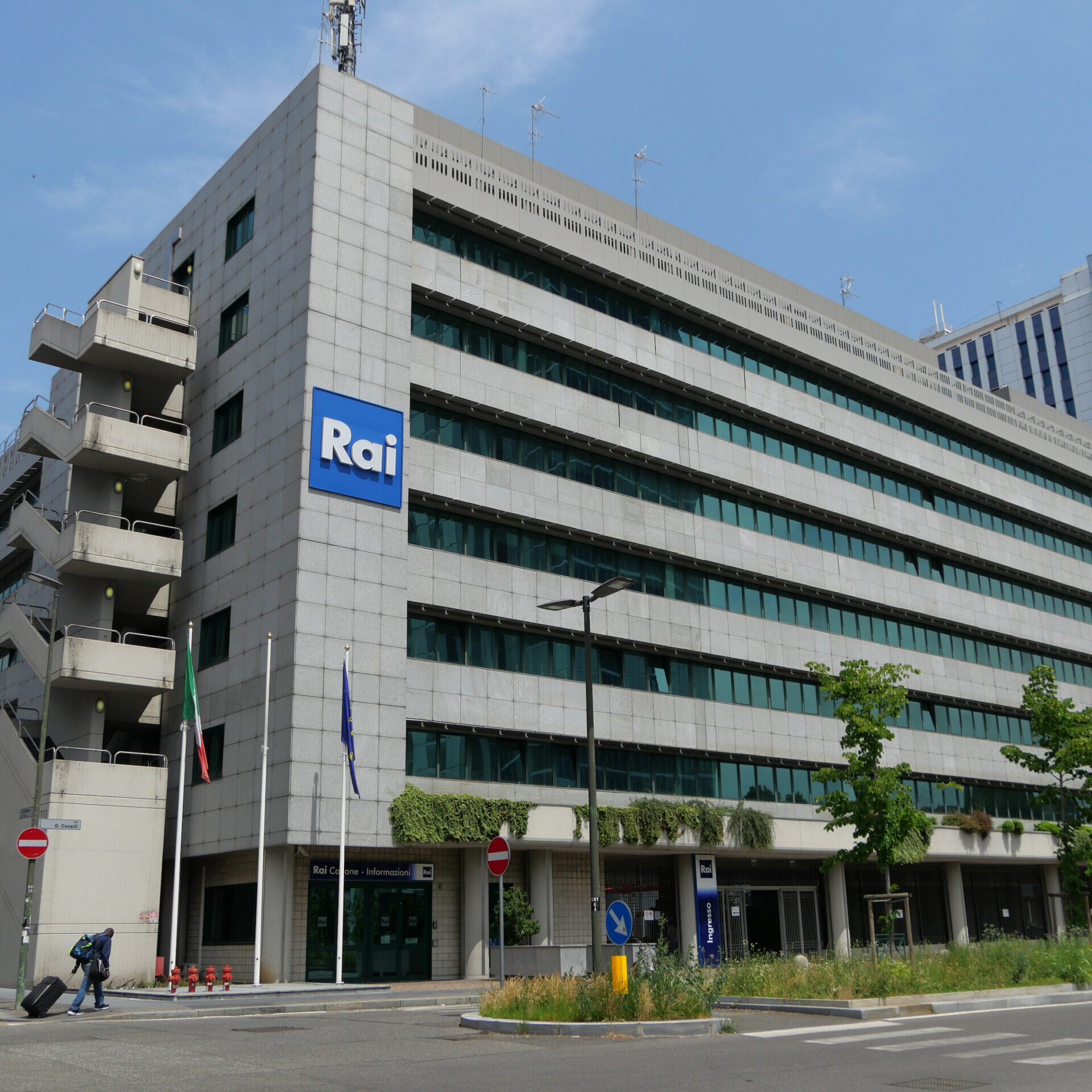 Exterior shot of Rai headquarters with Rai logo.